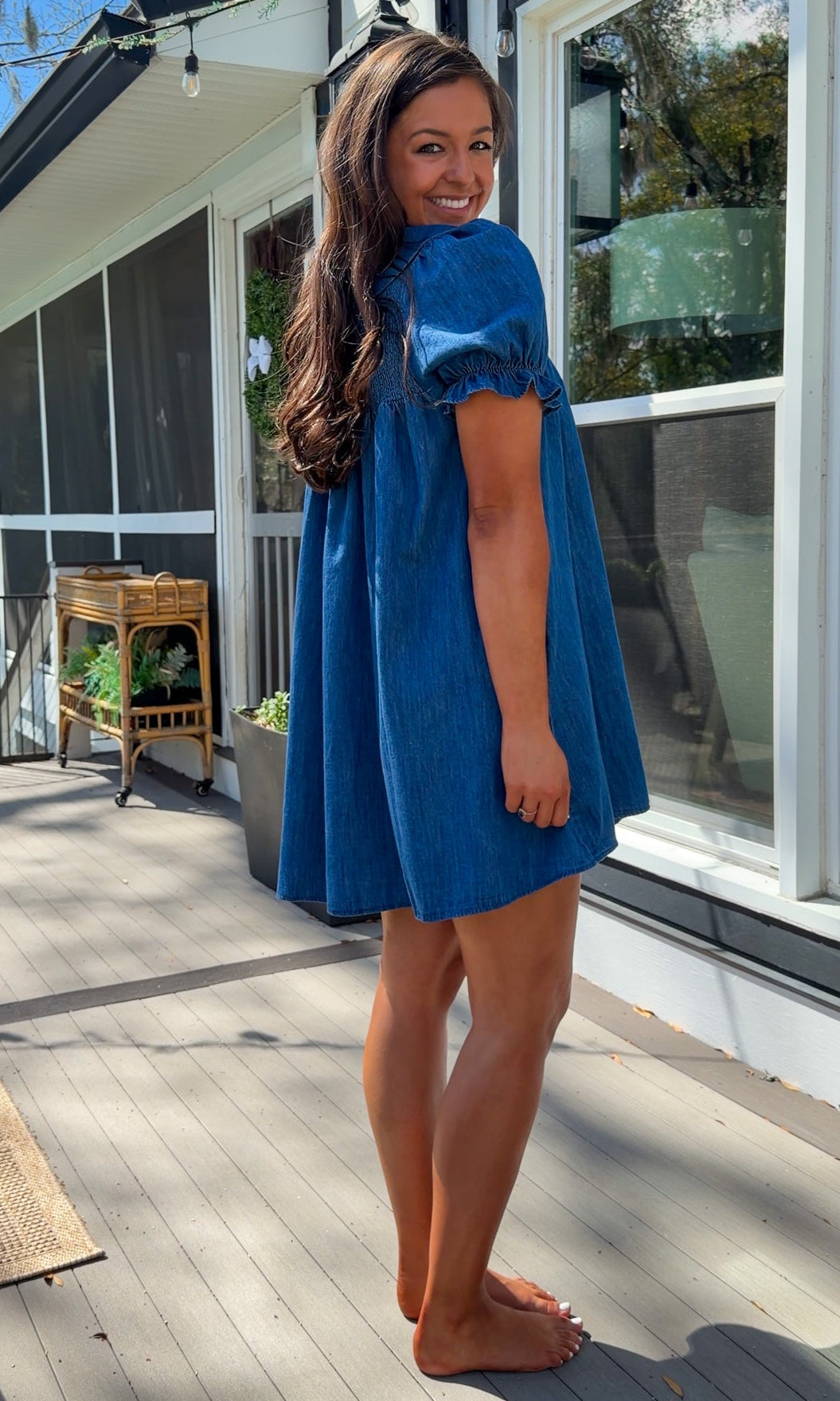 denim mini dress with peter pan collar puff sleeves button front and smocked back detail