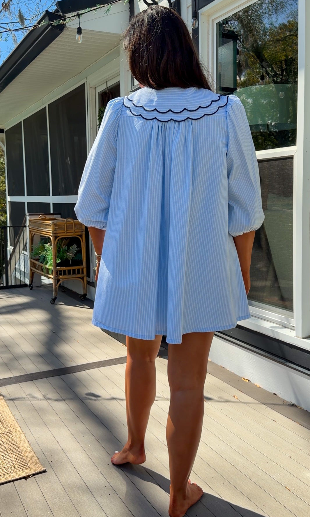 light blue striped mini dress with scalloped collar contrast trim bow tie and button front