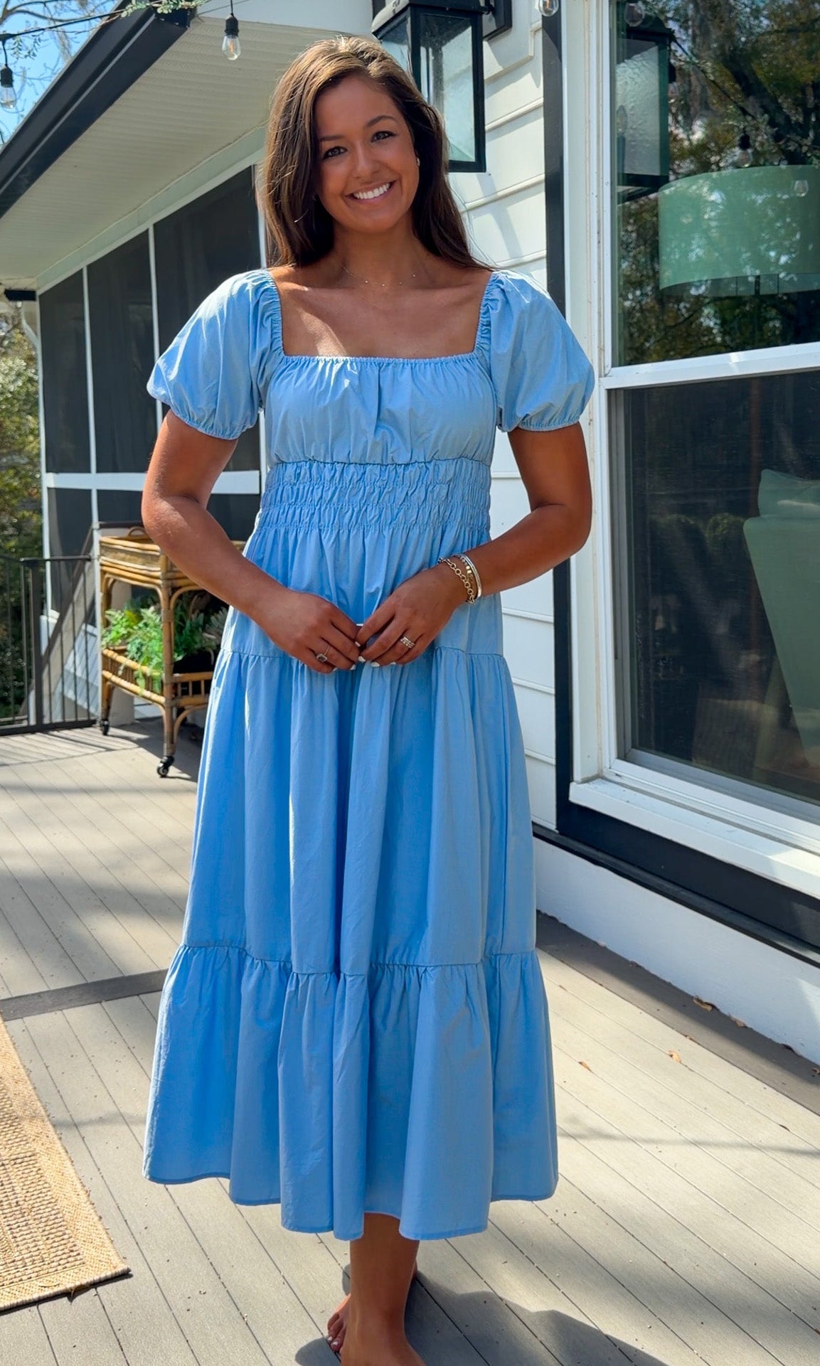 baby blue puff sleeve midi dress with square neckline smocked waist and tiered skirt