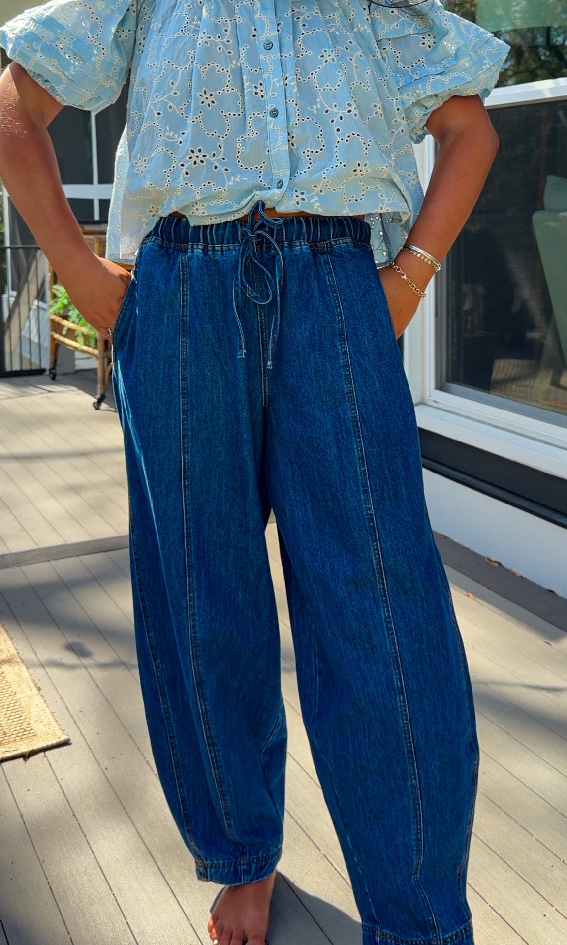 wide leg barrel denim pants with elastic drawstring waistband and front seam detail in medium wash