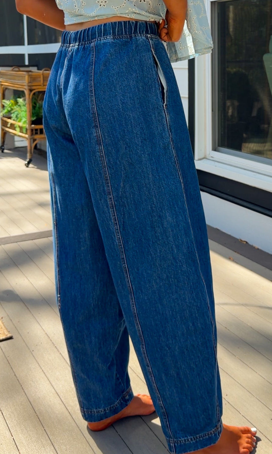 wide leg barrel denim pants with elastic drawstring waistband and front seam detail in medium wash