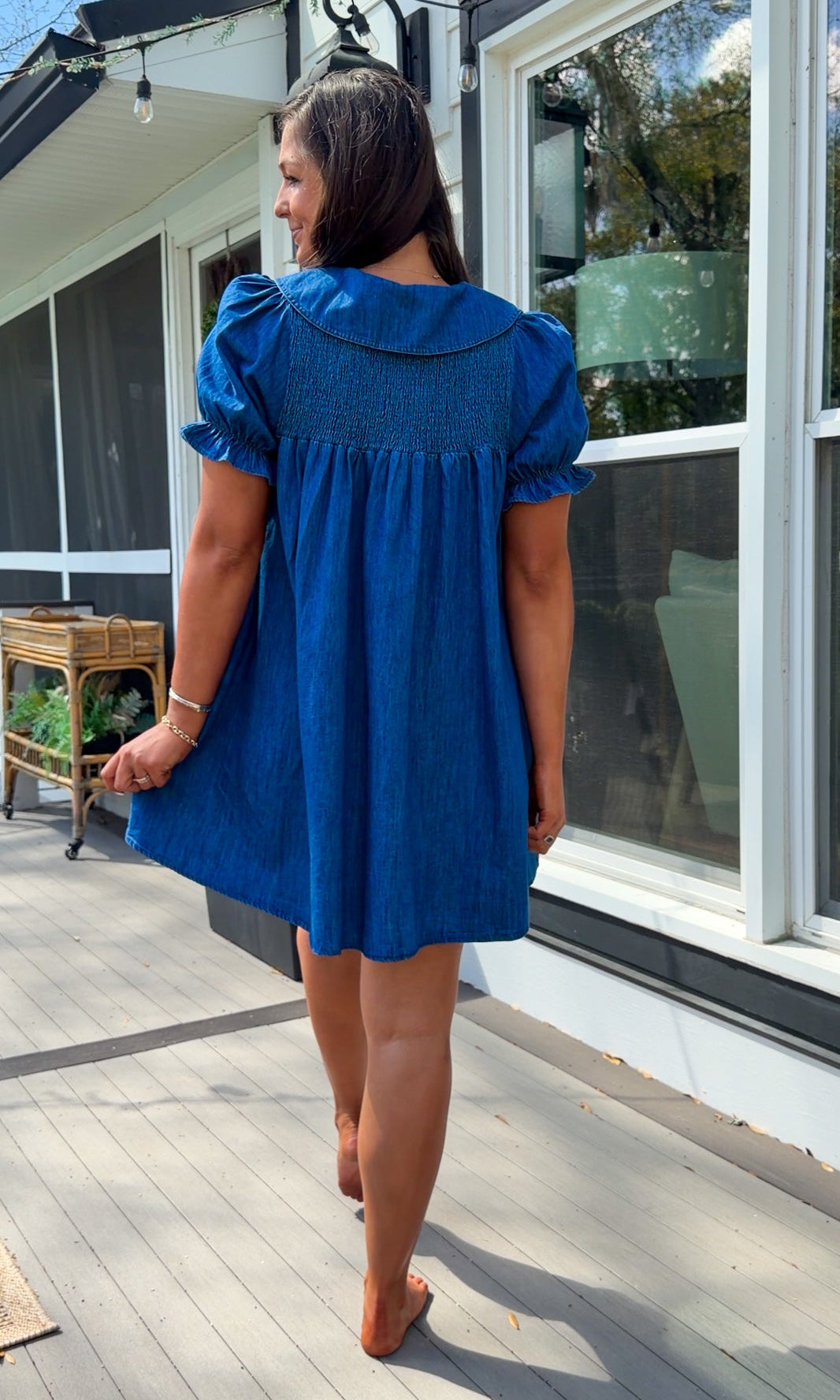 denim mini dress with peter pan collar puff sleeves button front and smocked back detail