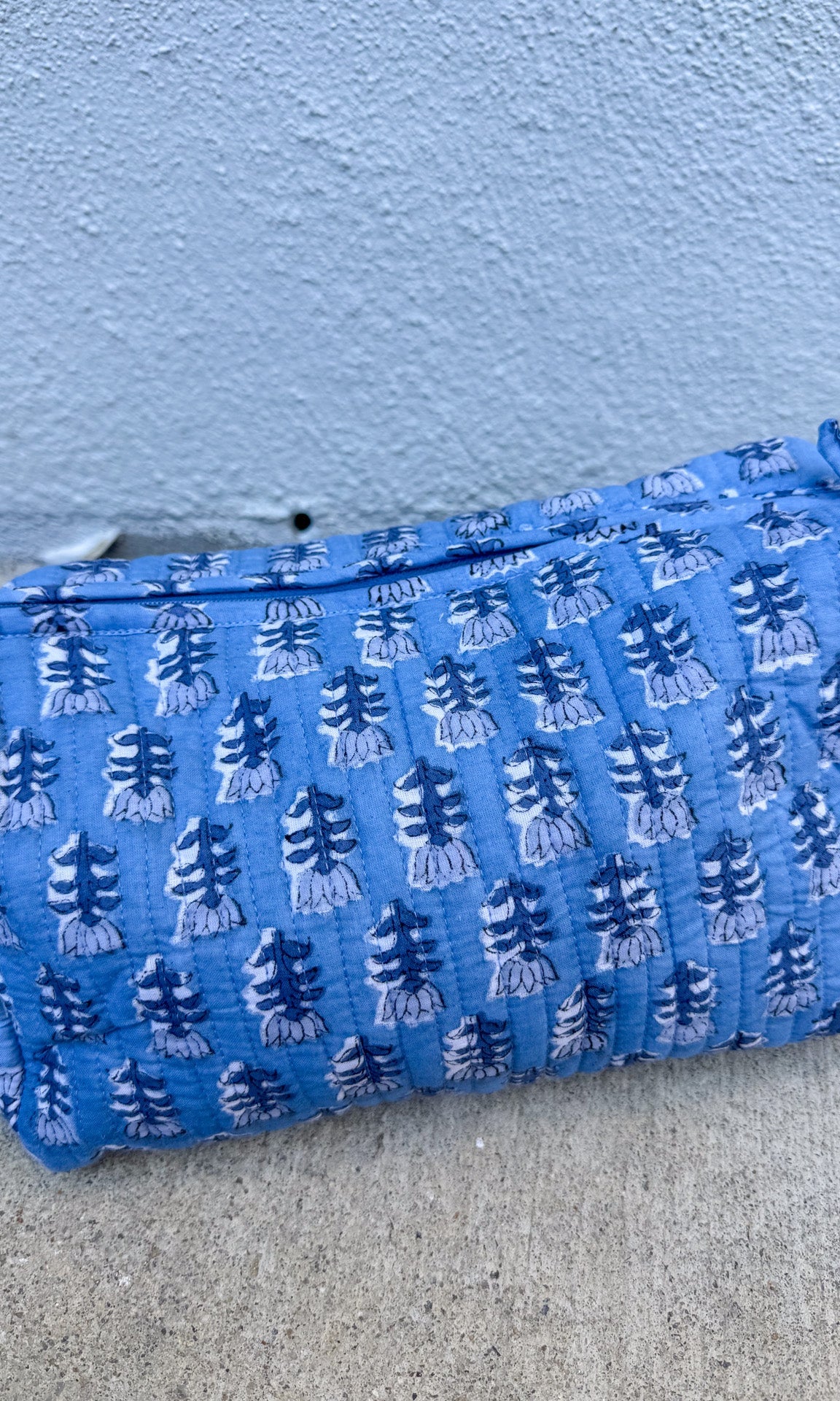 blue quilted block print cosmetic makeup bag