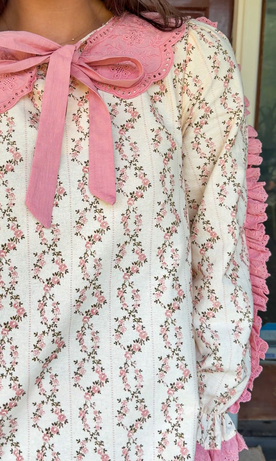 Cream rose stripe floral mini dress with pink scalloped lace collar and ribbon tie.