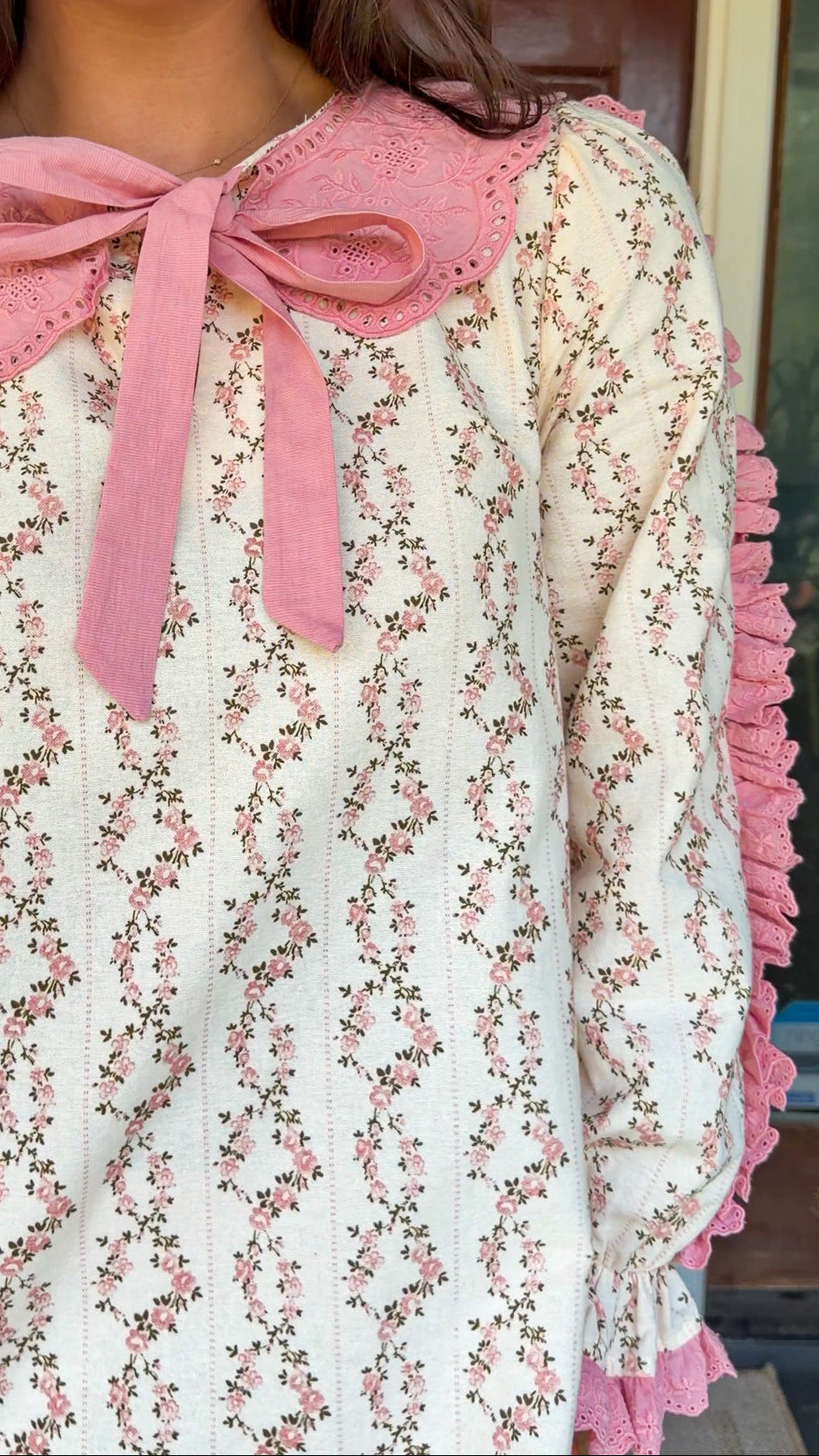 Cream rose stripe floral mini dress with pink scalloped lace collar and ribbon tie.