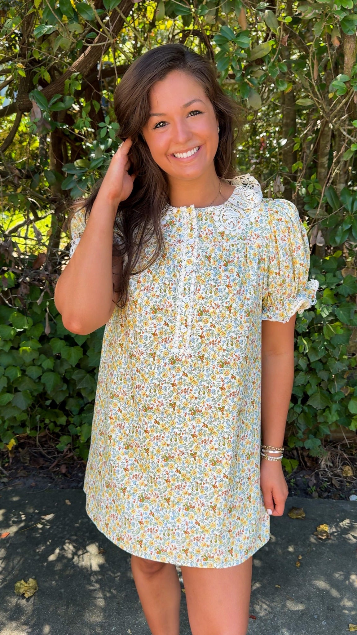 front closer view of fall floral mini dress with lace collar and detailing