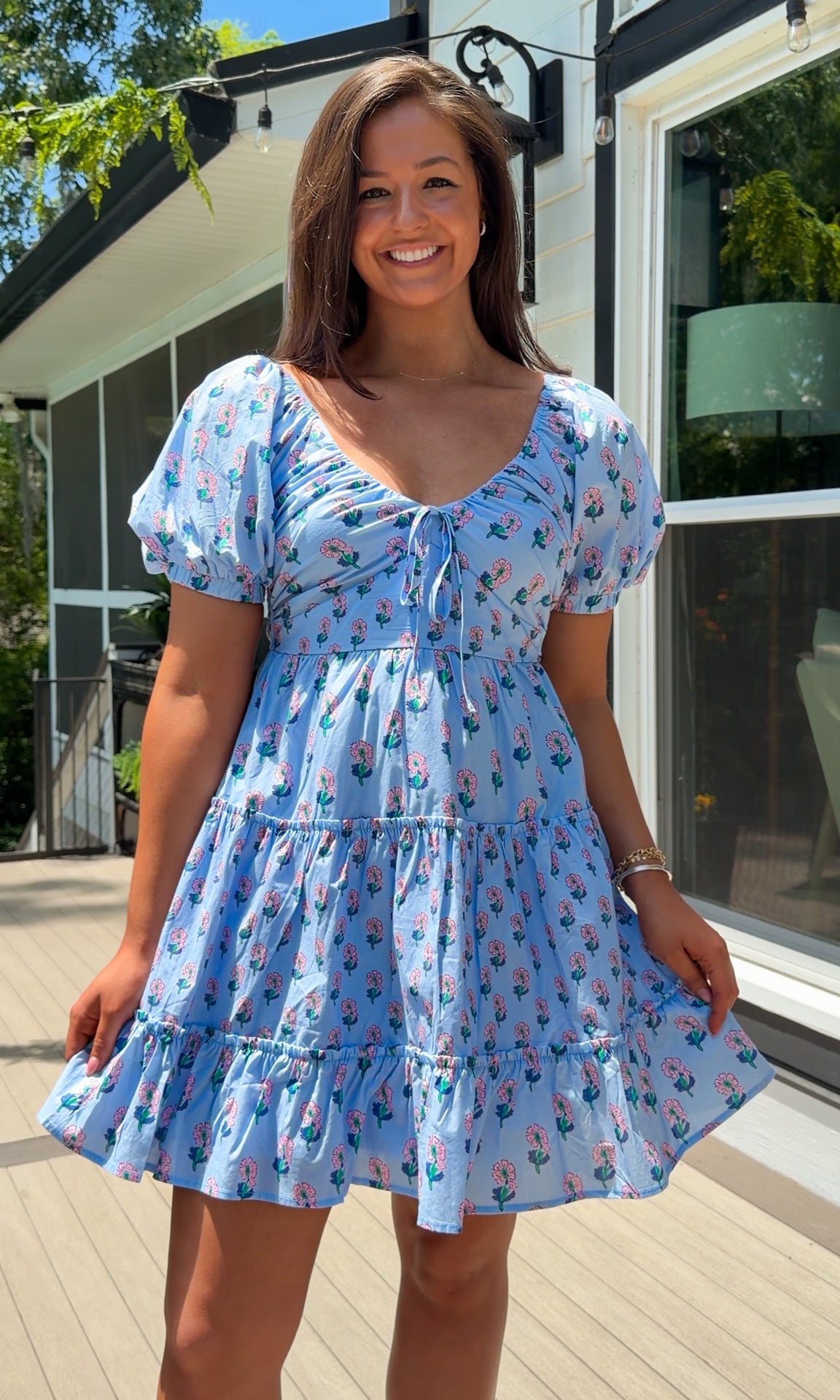 women's mini dress in blue floral puff sleeves