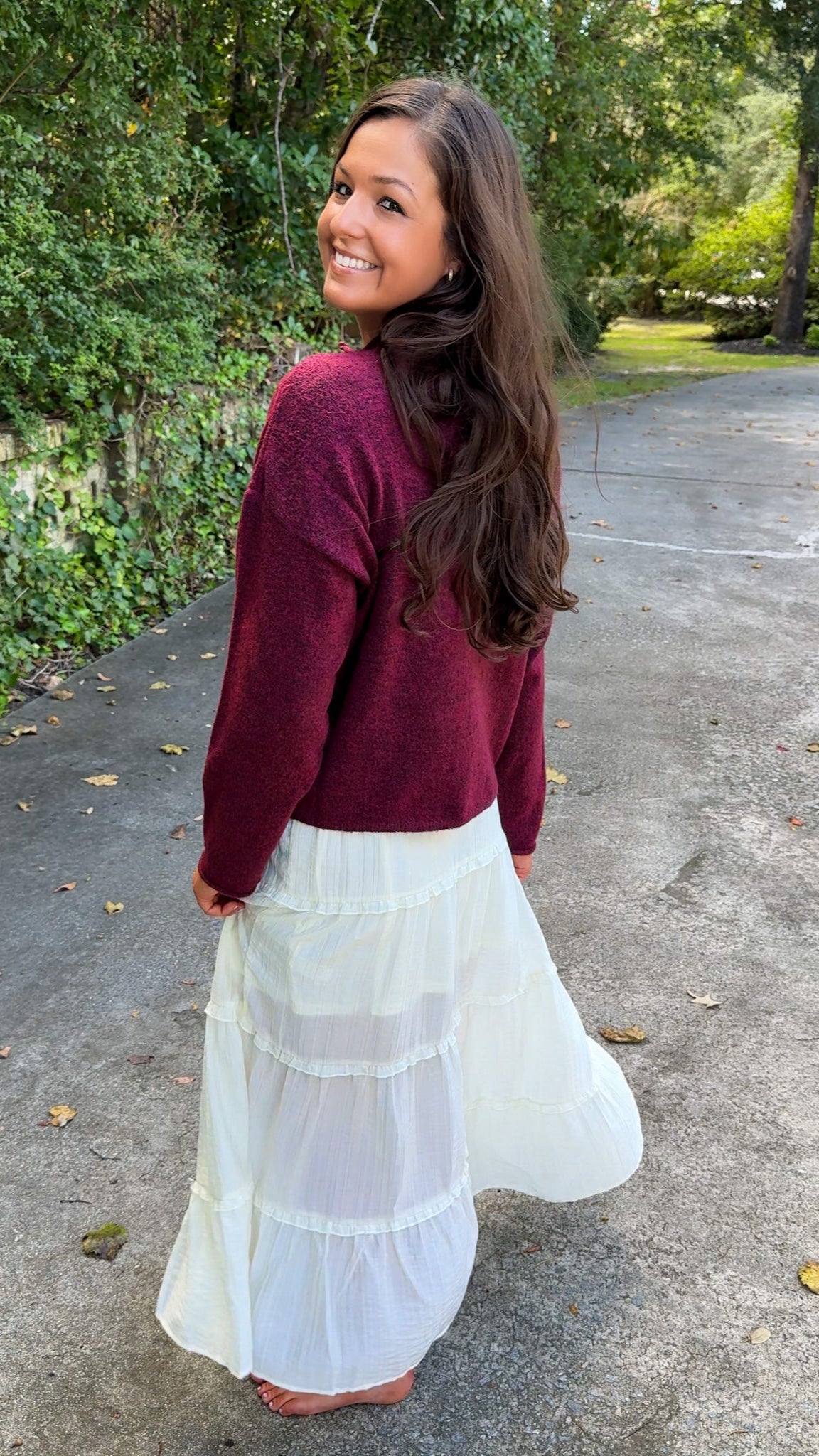 maroon sweater and ivory cream ruffle maxi skirt side view