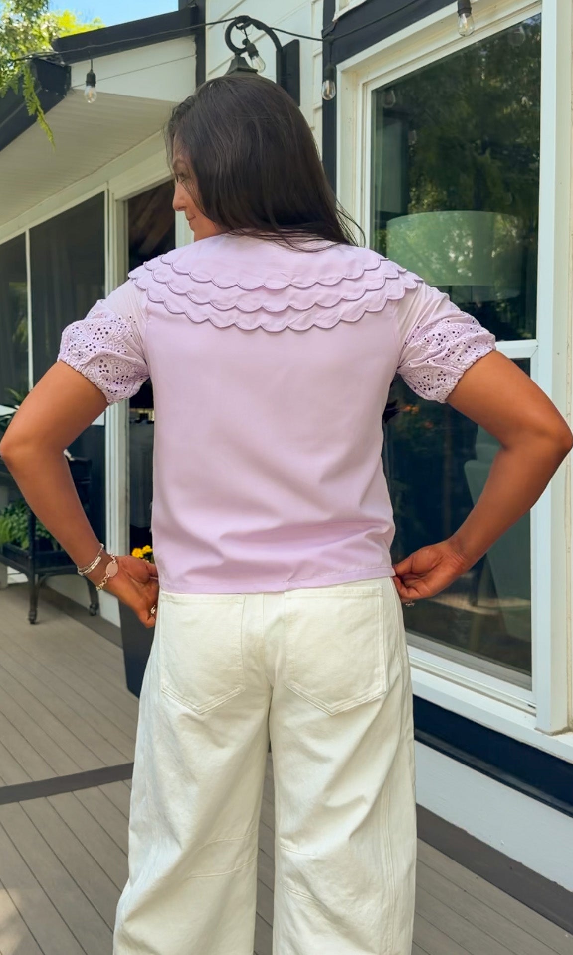 lilac top with eyelet puff sleeves and oversized collar button down closure