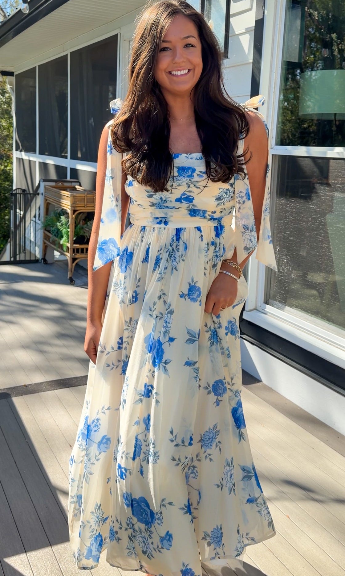 women's floral blue cream midi dress with smocked detailing and tie straps flowy