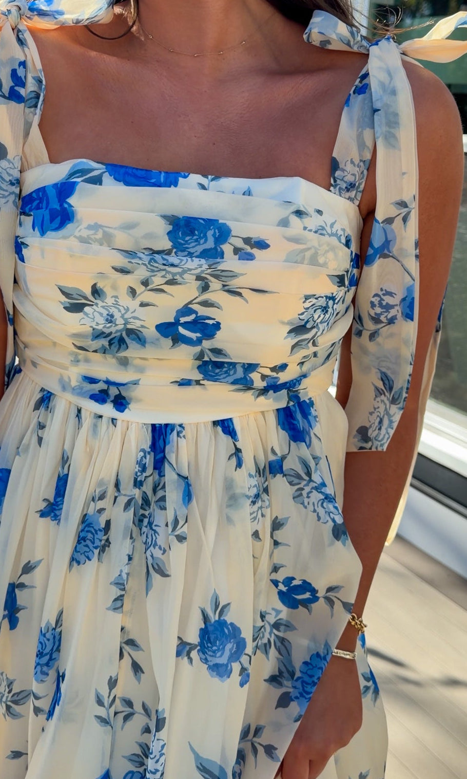 women's floral blue cream midi dress with smocked detailing and tie straps flowy