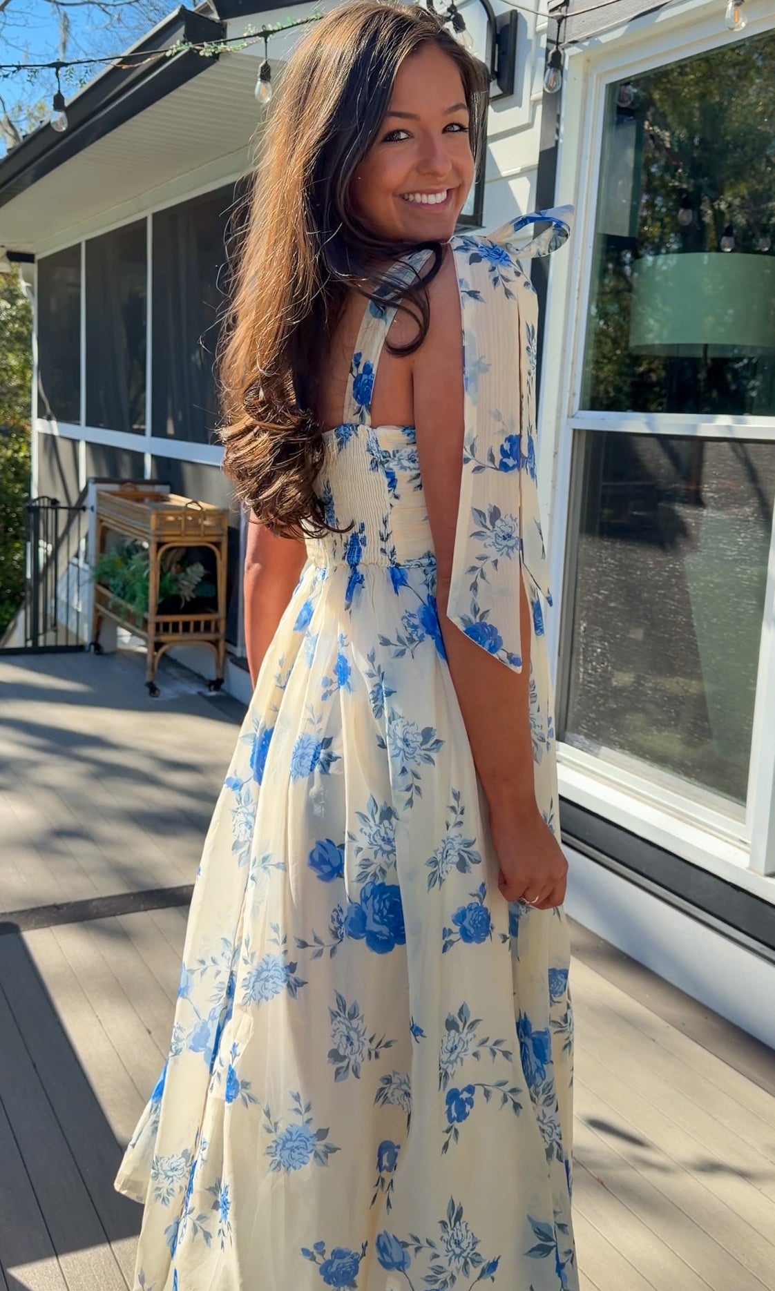 women's floral blue cream midi dress with smocked detailing and tie straps flowy