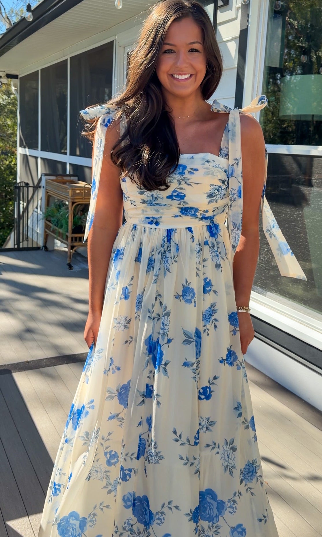 women's floral blue cream midi dress with smocked detailing and tie straps flowy