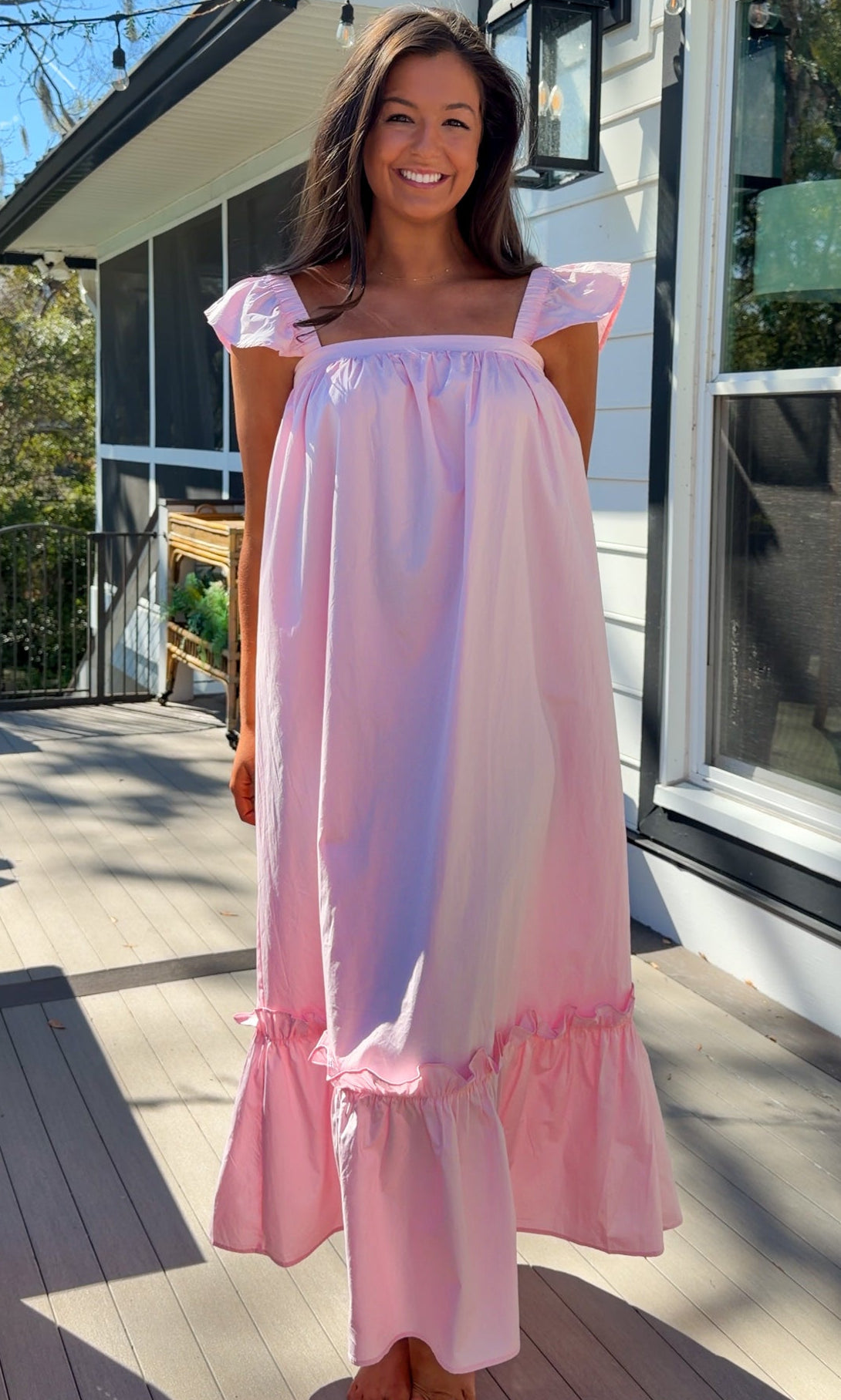 baby pink midi dress with flutter sleeves and tiered ruffle hem