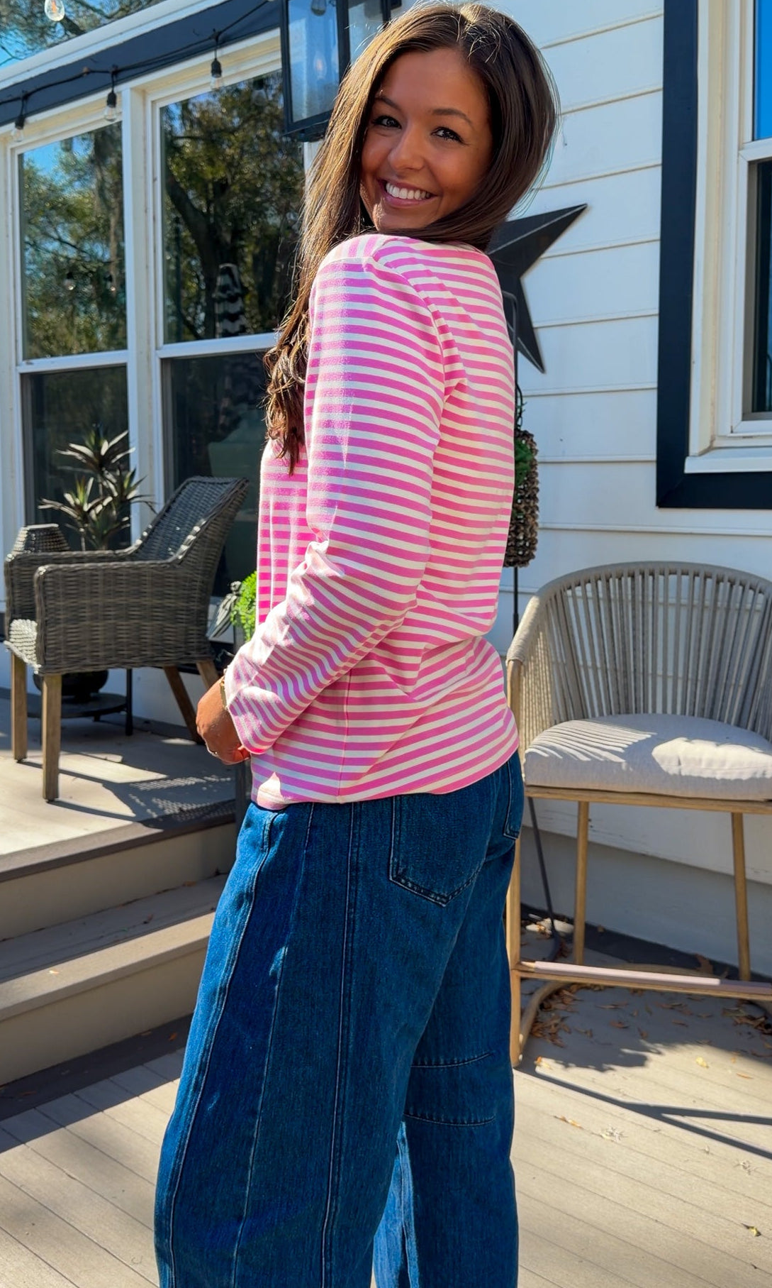 pink and white striped long sleeve knit top with relaxed fit