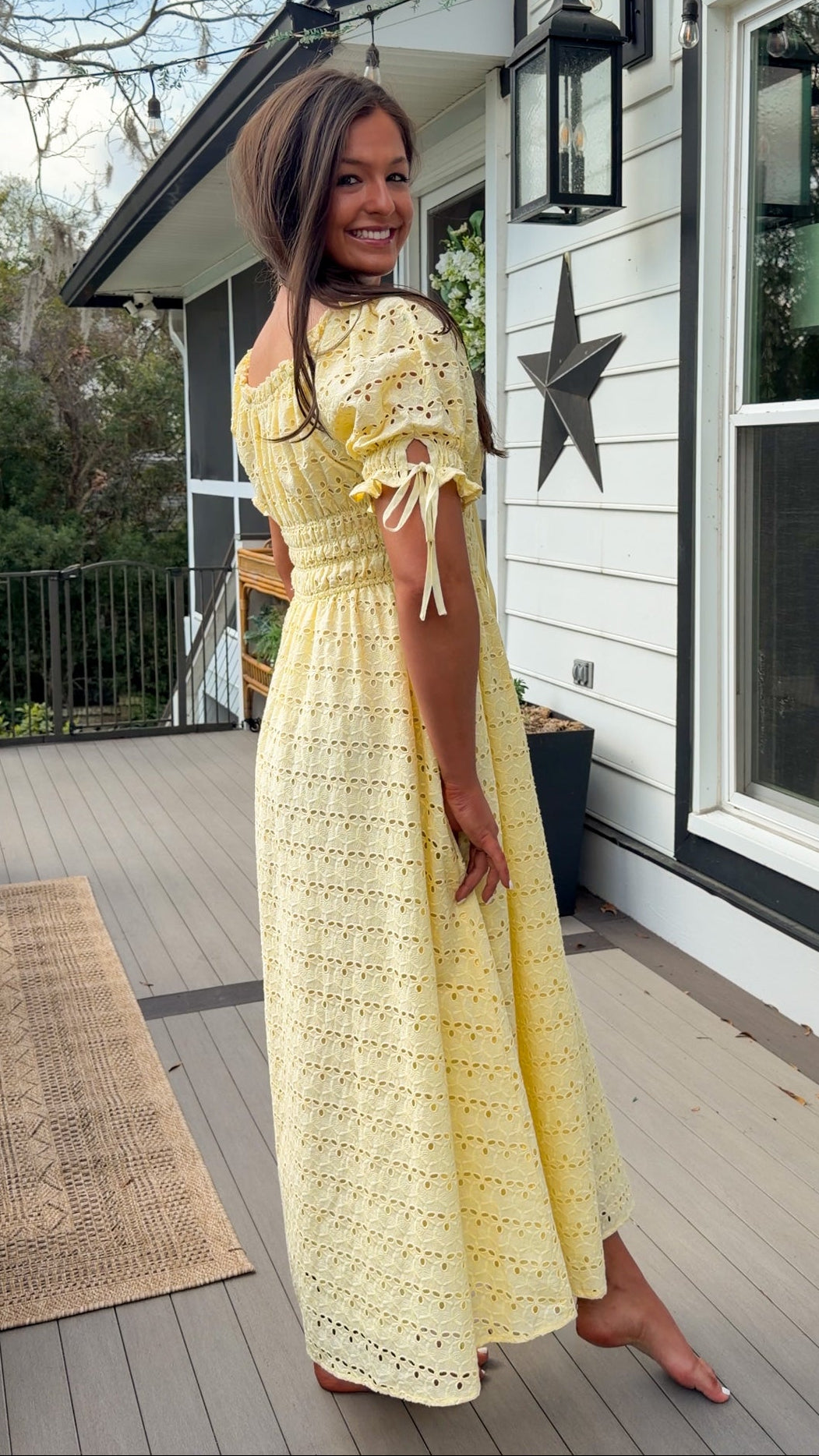 Yellow eyelet lace maxi dress with smocked bodice and puff sleeves