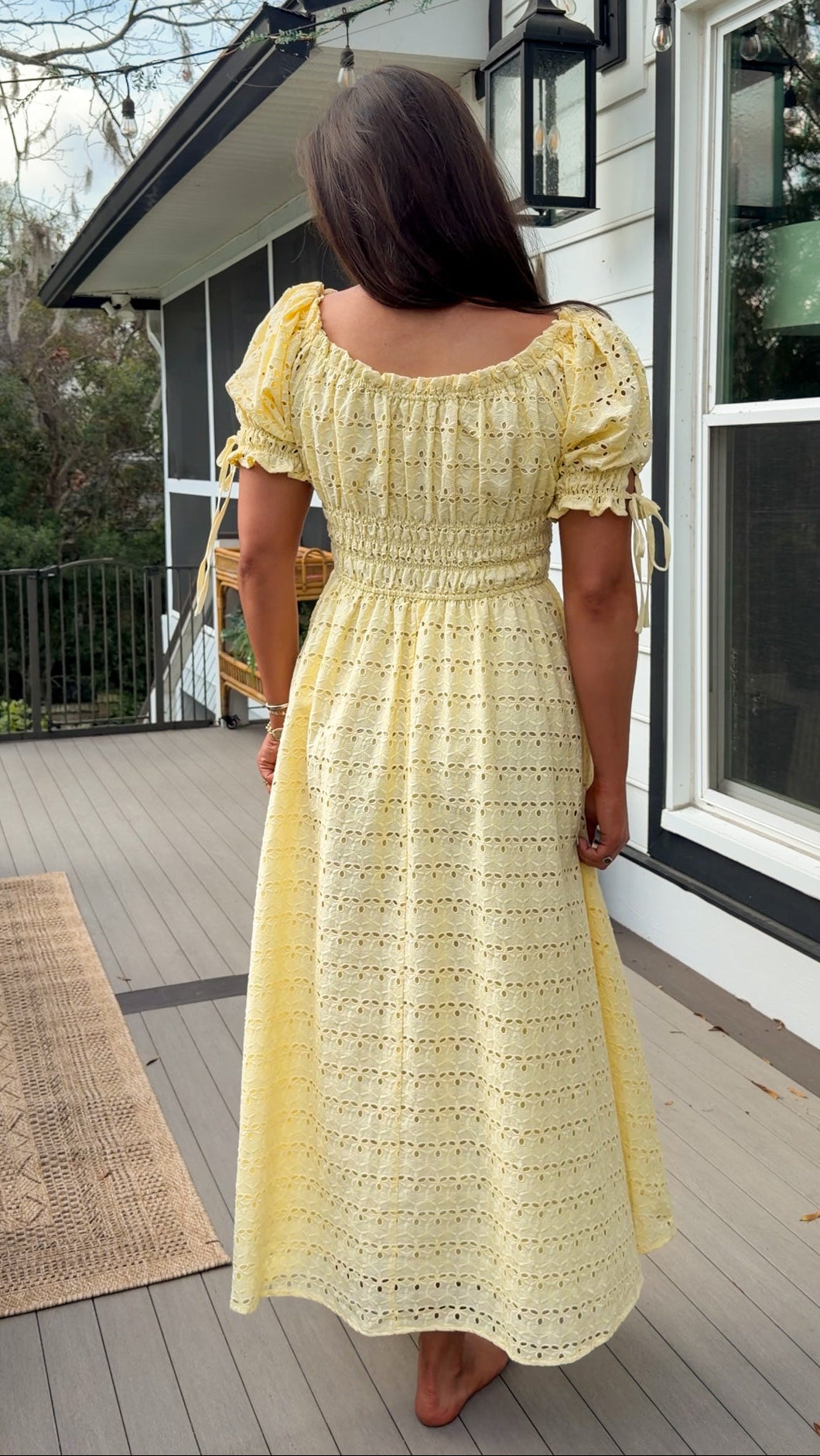 Yellow eyelet lace maxi dress with smocked bodice and puff sleeves