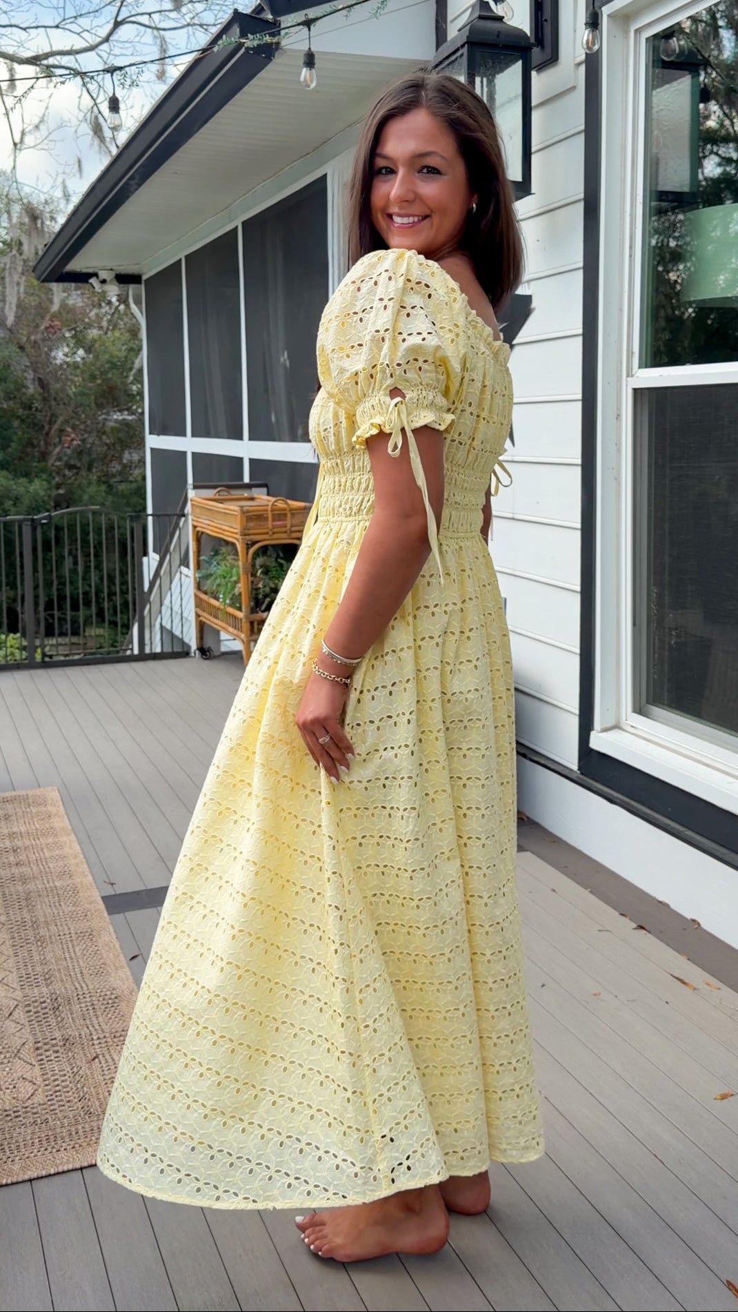Yellow eyelet lace maxi dress with smocked bodice and puff sleeves