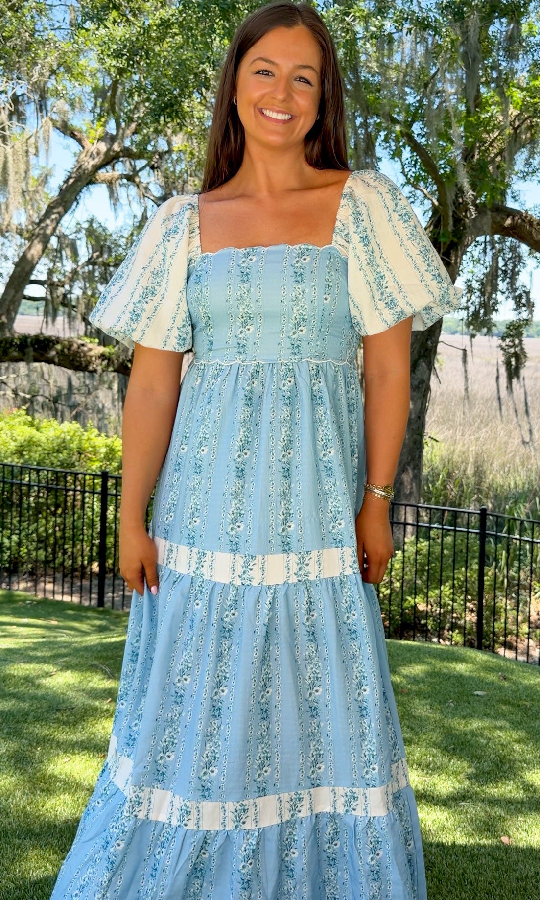 blue and white floral maxi dress with puff sleeves