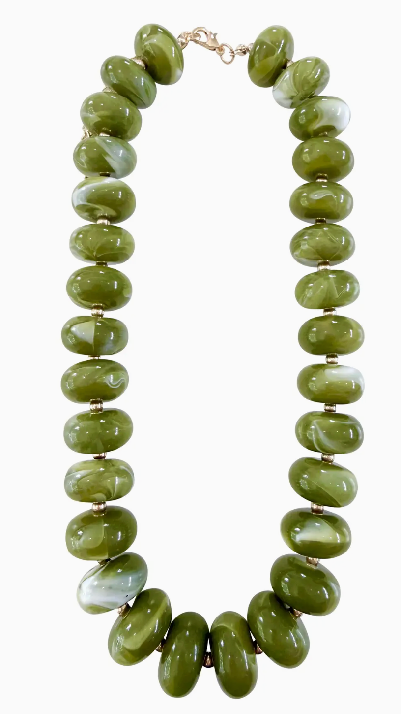 A chunky beaded necklace made of glossy olive green stone beads with a small gold clasp, shown on a plain white background.