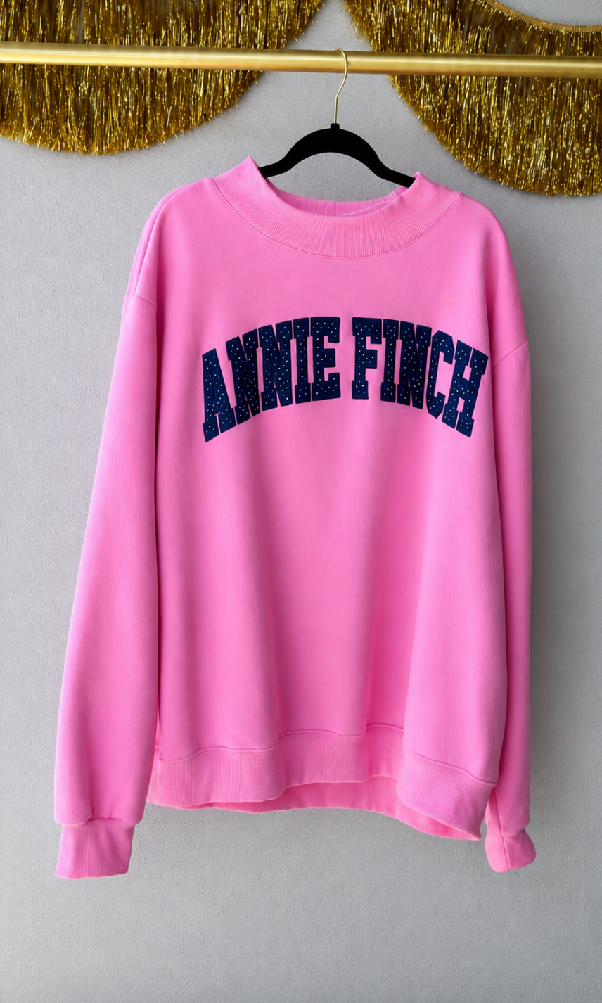 pink mockneck sweatshirt navy and white dot "annie finch" embroidery