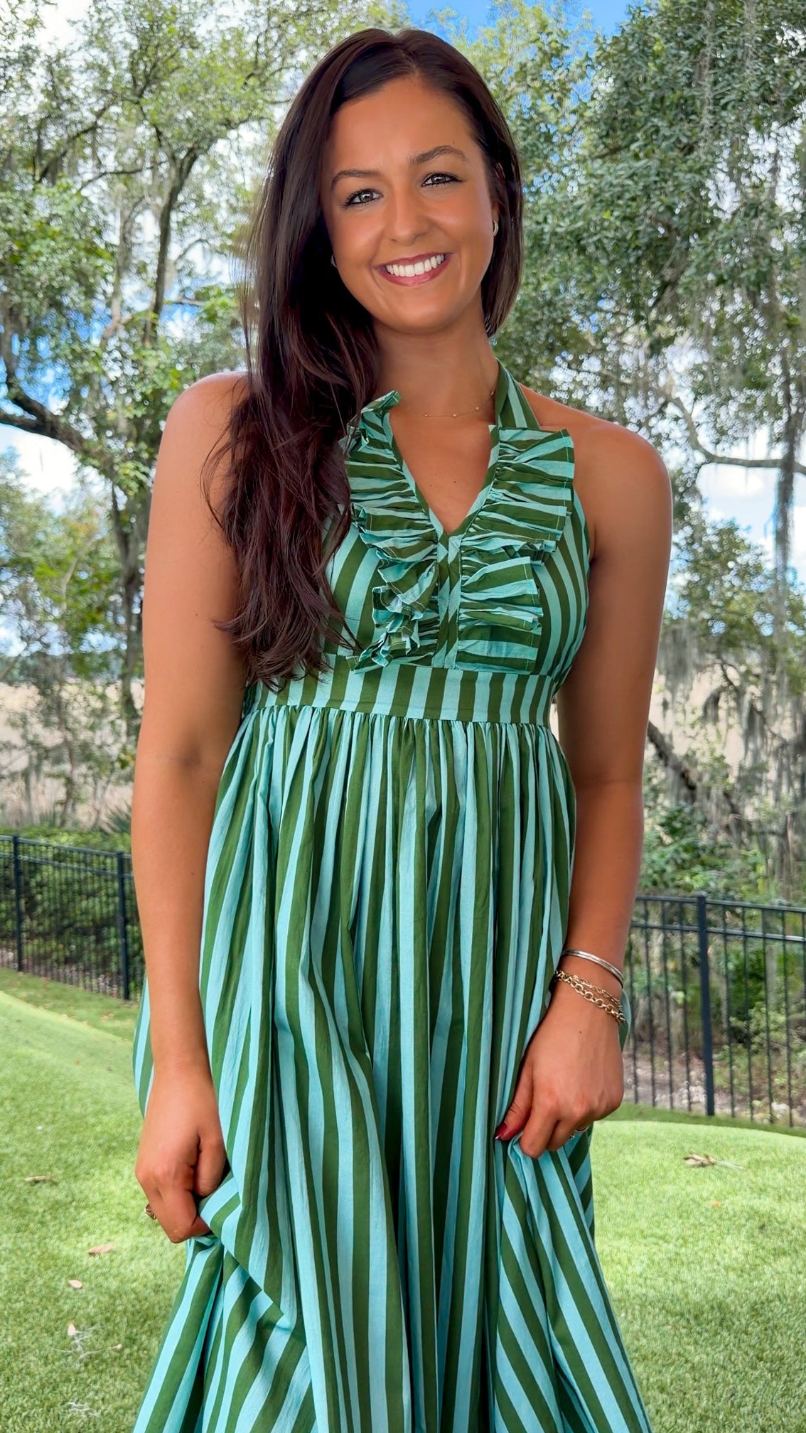 green striped halter neck midi dress ruffle neckline tie closure back