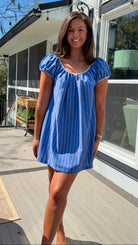 blue stripe babydoll mini dress with gathered neckline short sleeves and side pockets