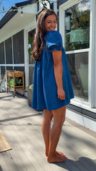denim mini dress with peter pan collar puff sleeves button front and smocked back detail