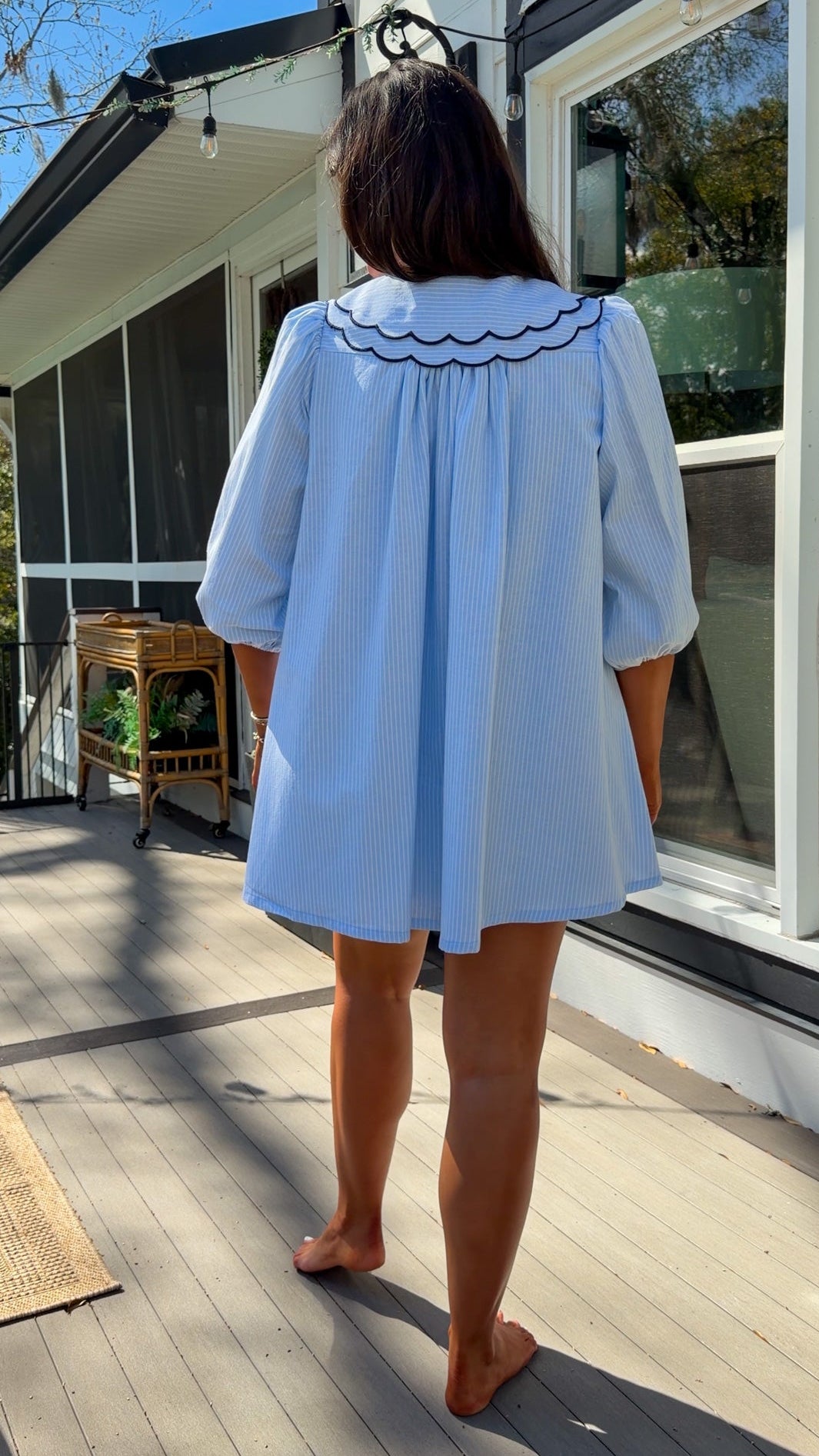 light blue striped mini dress with scalloped collar contrast trim bow tie and button front