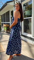 midnight blue polka dot maxi dress with smocked bodice and adjustable spaghetti straps