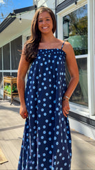 midnight blue polka dot maxi dress with smocked bodice and adjustable spaghetti straps