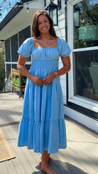 baby blue puff sleeve midi dress with square neckline smocked waist and tiered skirt