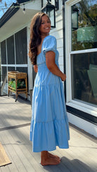 baby blue puff sleeve midi dress with square neckline smocked waist and tiered skirt