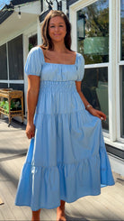 baby blue puff sleeve midi dress with square neckline smocked waist and tiered skirt