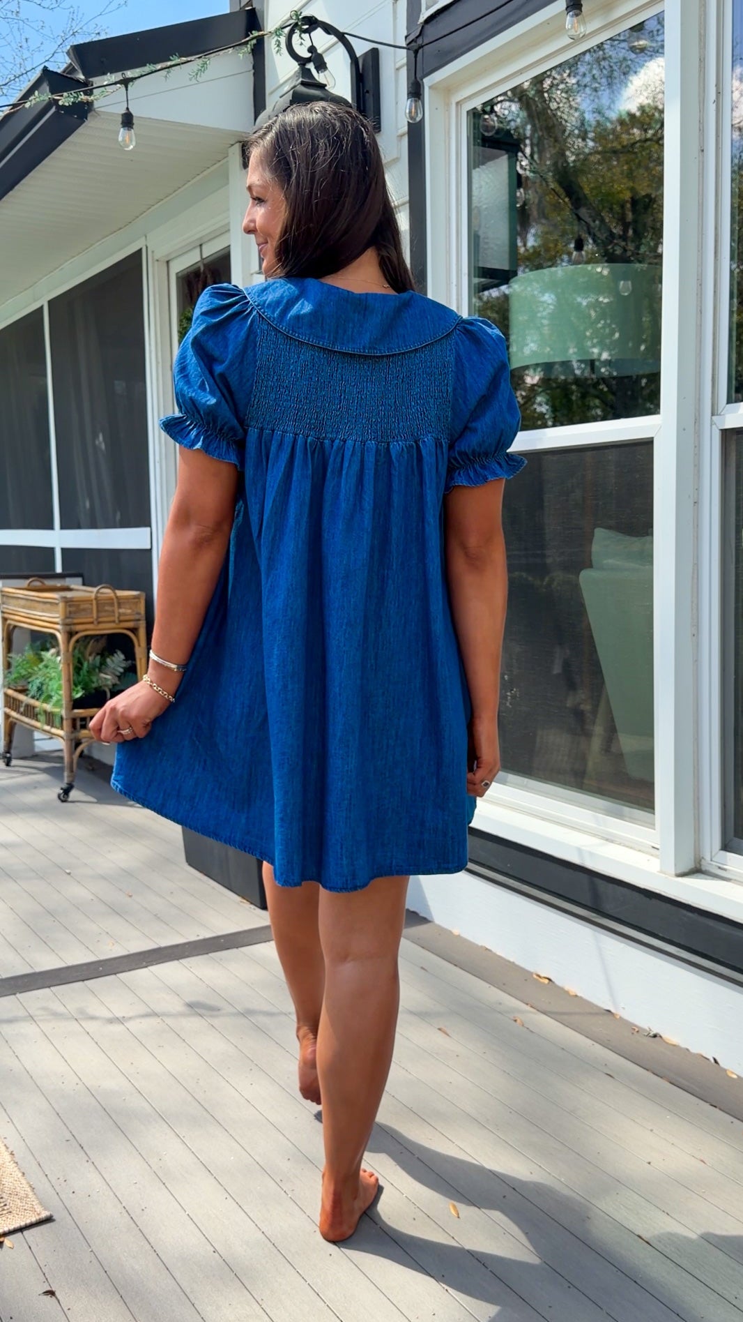 denim mini dress with peter pan collar puff sleeves button front and smocked back detail