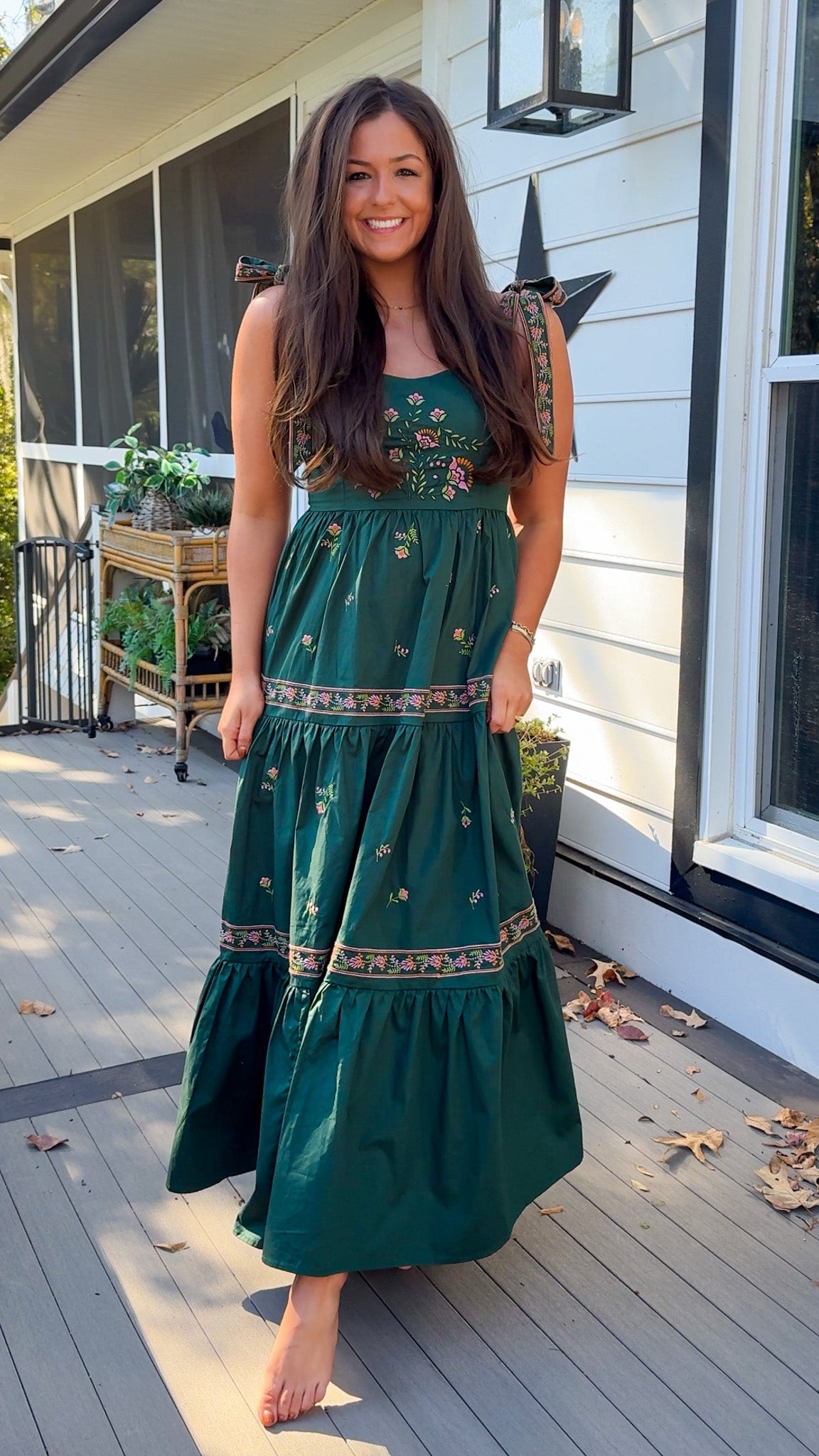 green dress with floral embroidery front