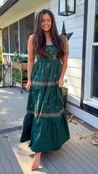 green dress with floral embroidery front