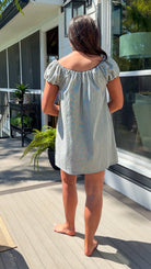 black and white gingham mini dress with cap sleeves and bow