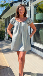 black and white gingham mini dress with cap sleeves and bow