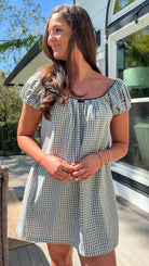 black and white gingham mini dress with cap sleeves and bow