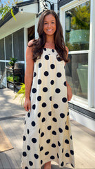 cream and black polka dot maxi dress