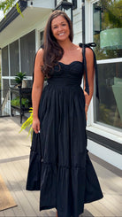 black midi dress with ruched bust tie straps smocked back and tiered skirt