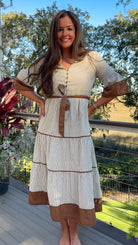beige midi dress with brown stripes and details and belt front  3
