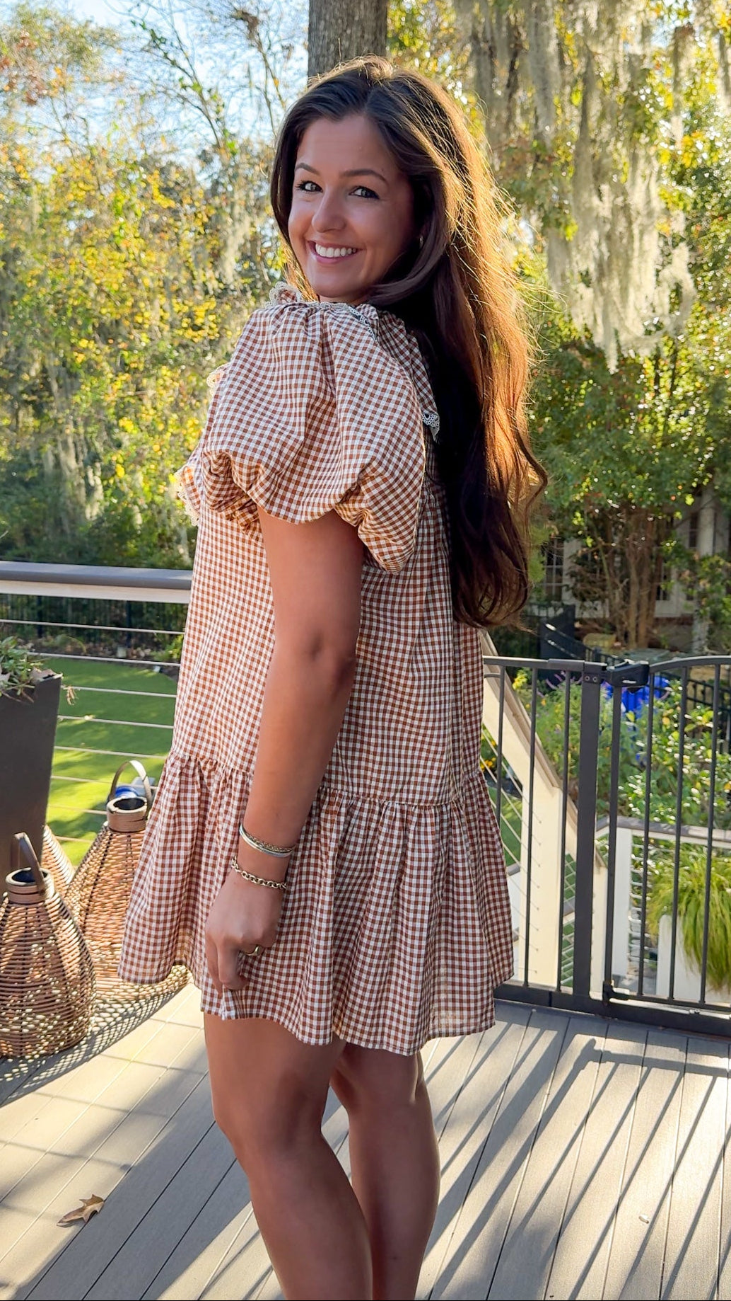 gingham orange and brown mini dress with ruffle collar and lace trim side view