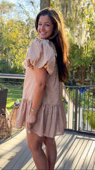 gingham orange and brown mini dress with ruffle collar and lace trim side view