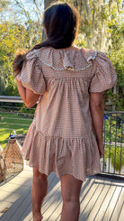 gingham orange and brown mini dress with ruffle collar and lace trim back view