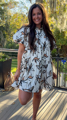 floral dress collared cream white and brown floral design button down closure and puff sleeves 2