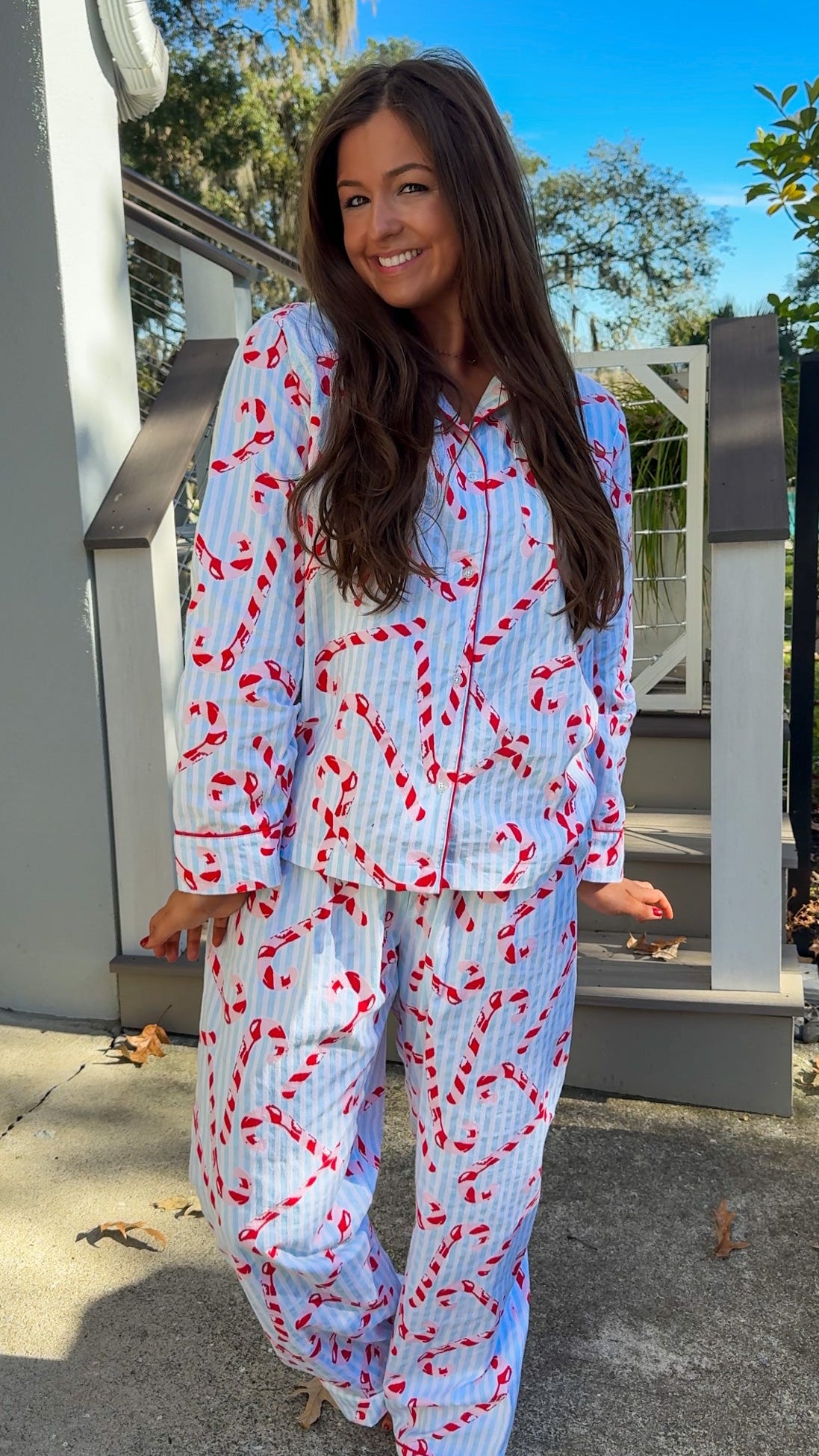 blue and white stripe pajama long pant and long sleeve shirt set with candy canes and button down closure soft loungewear cute