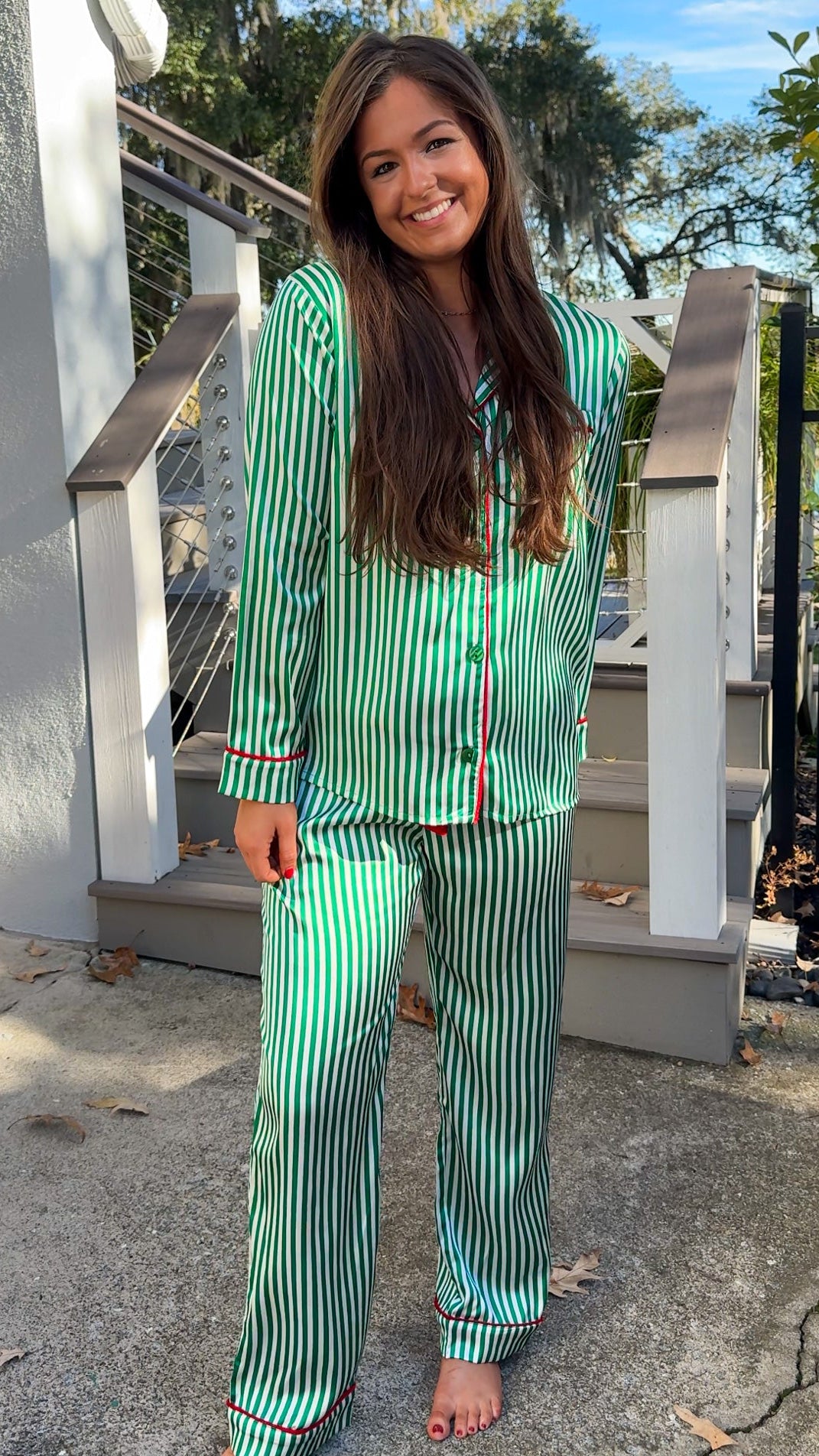 satin green stripe christmas pajama set with red velvet details and belt pant set button down closure long sleeve close