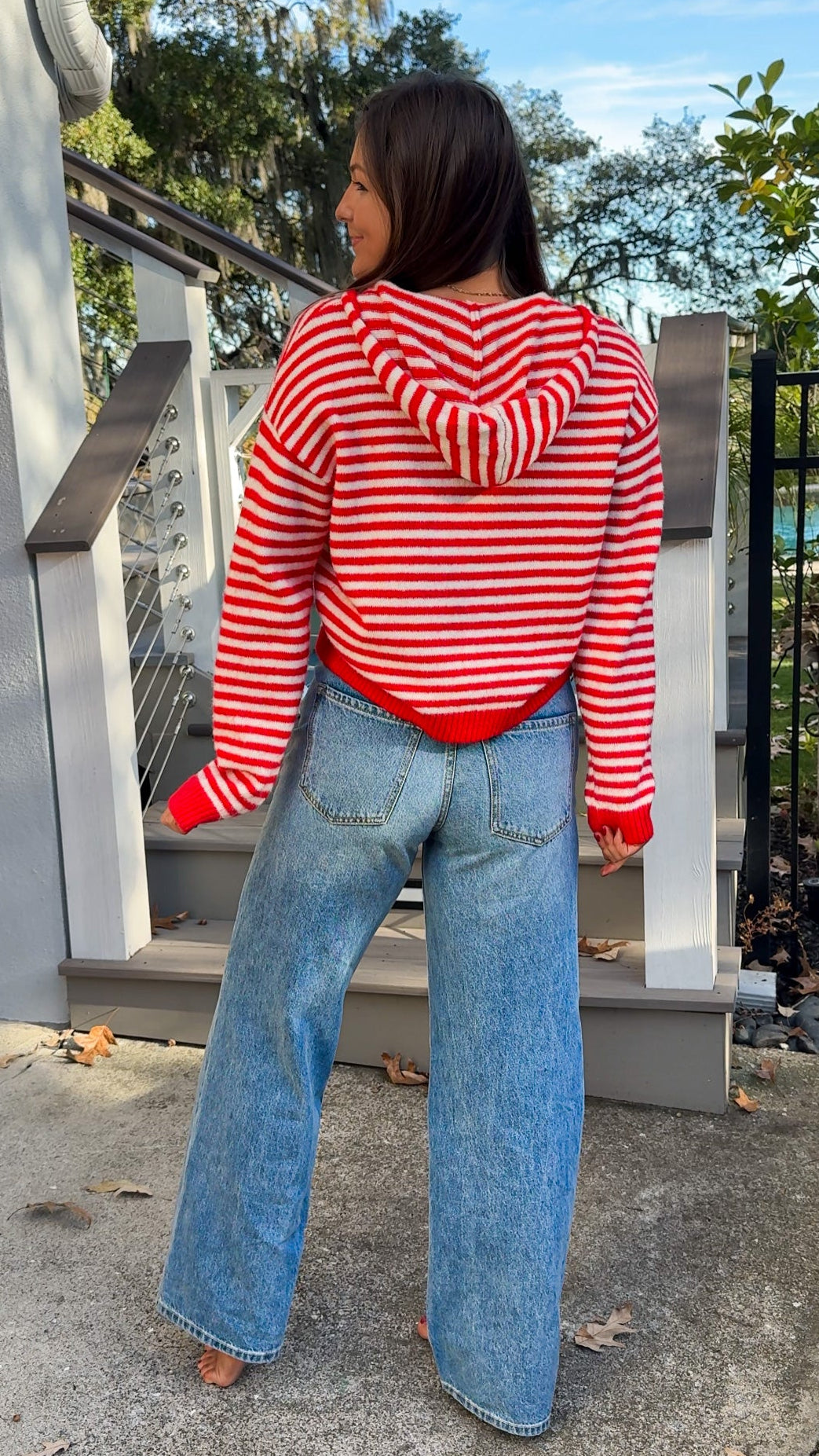 red and white stripe zip up sweater with hood long sleeve top back view